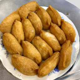Dao He Shou Si  - sushi wrapped in fried tofu -